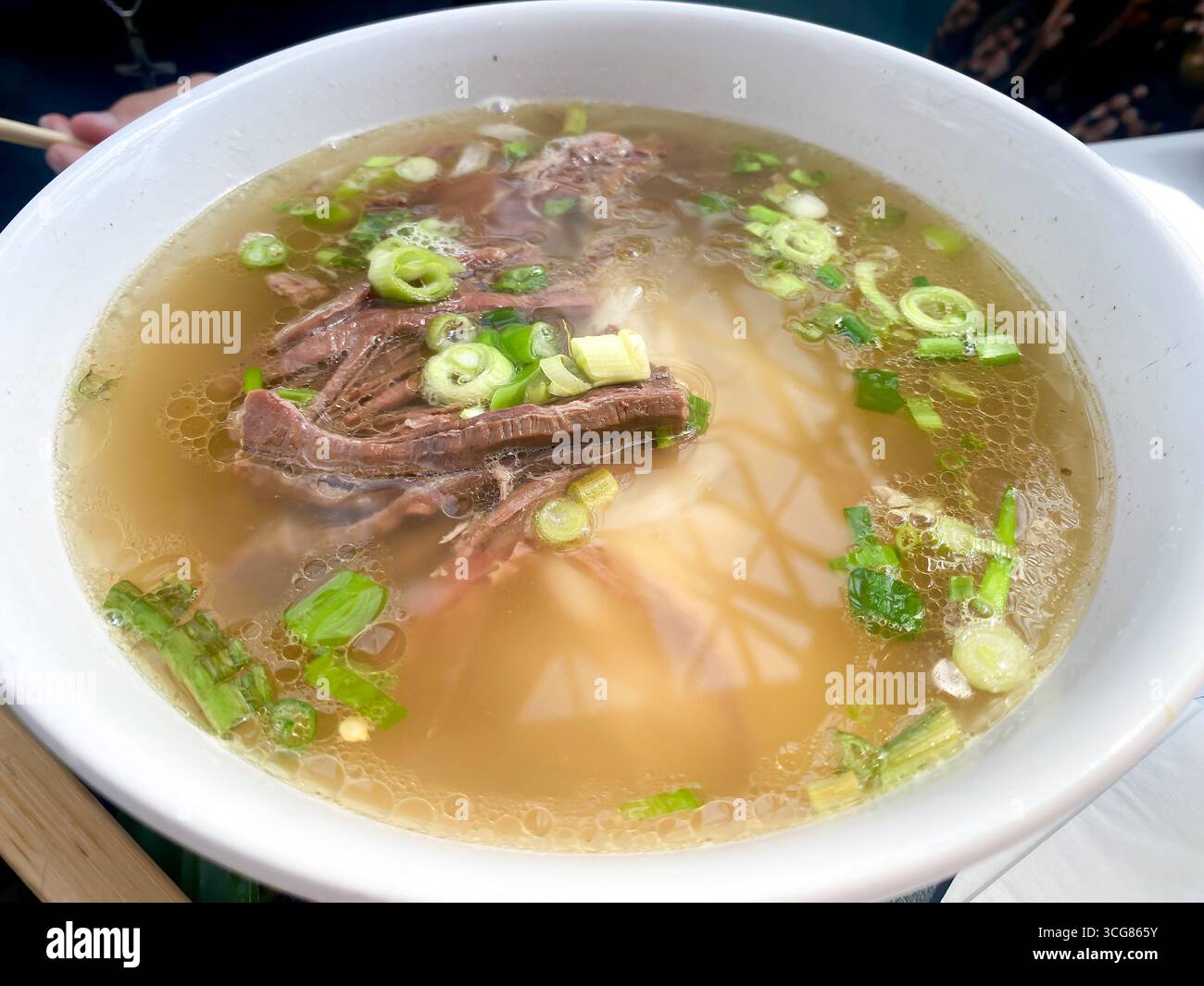 Beef brisket pho, a Vietnamese broth with noodles - Smartphone Captured Stock Image