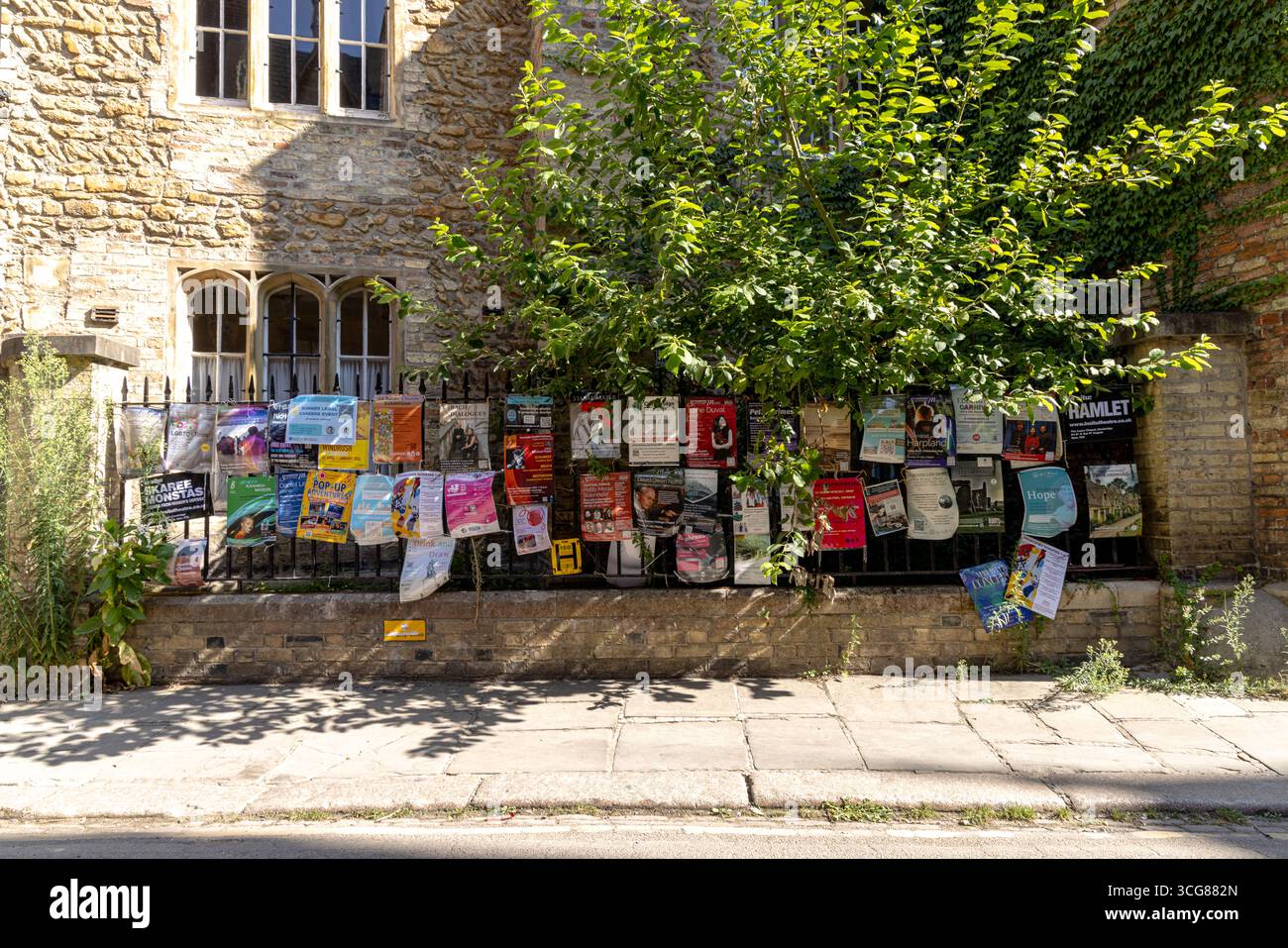 Posters on railings, Cambridge City Centre, England, UK Stock Photo