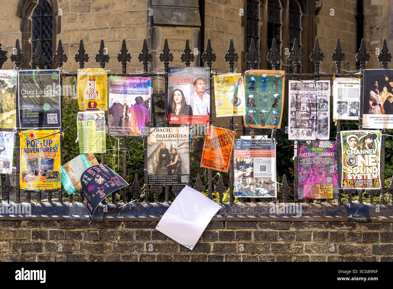Posters on railings, Cambridge City Centre, England, UK Stock Photo