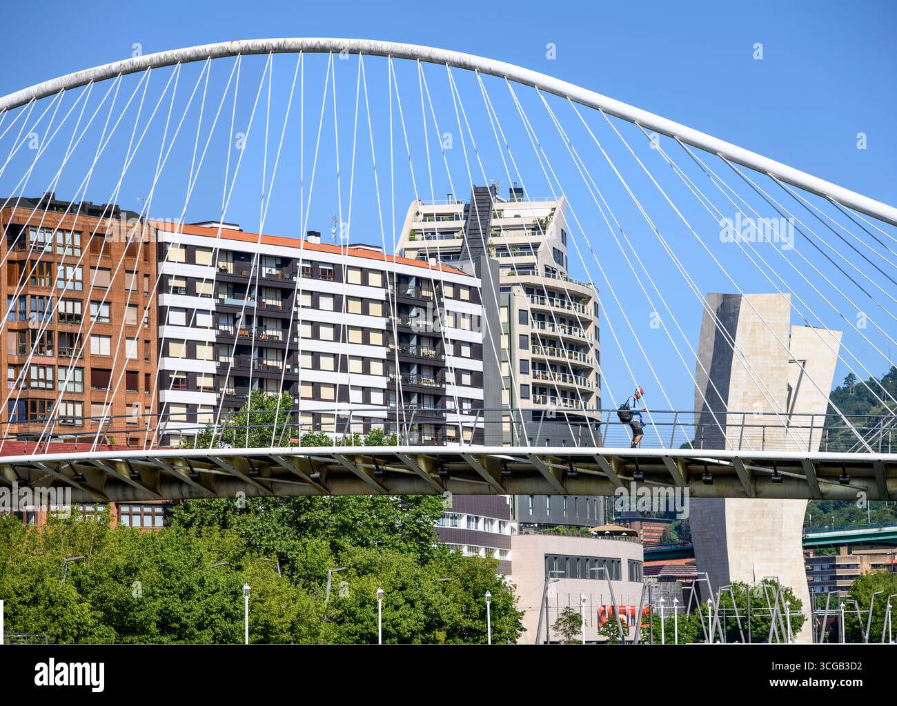 The Zubizuri (White) footbridge also known as the Calatrava bridge, after the architect Santiago Calatrava, spanning the Nervion River , Bilbao, Basqu Stock Photo
