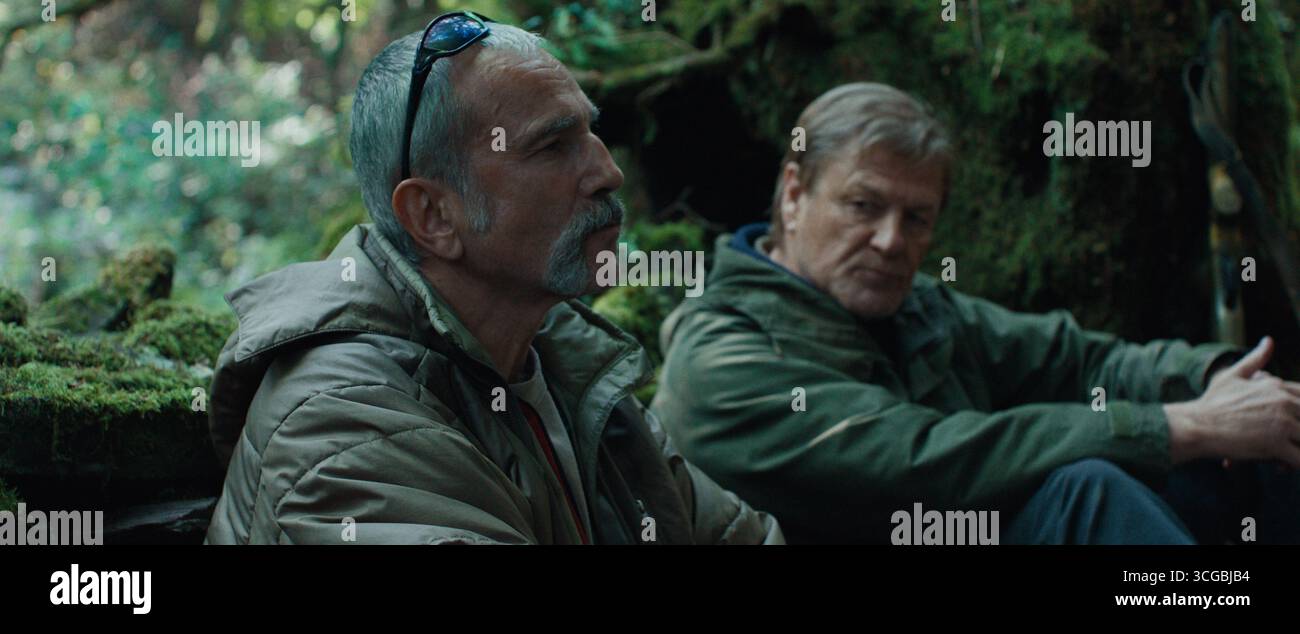 Tom Adams holds a gun to Michael Ripper in a scene from the movie