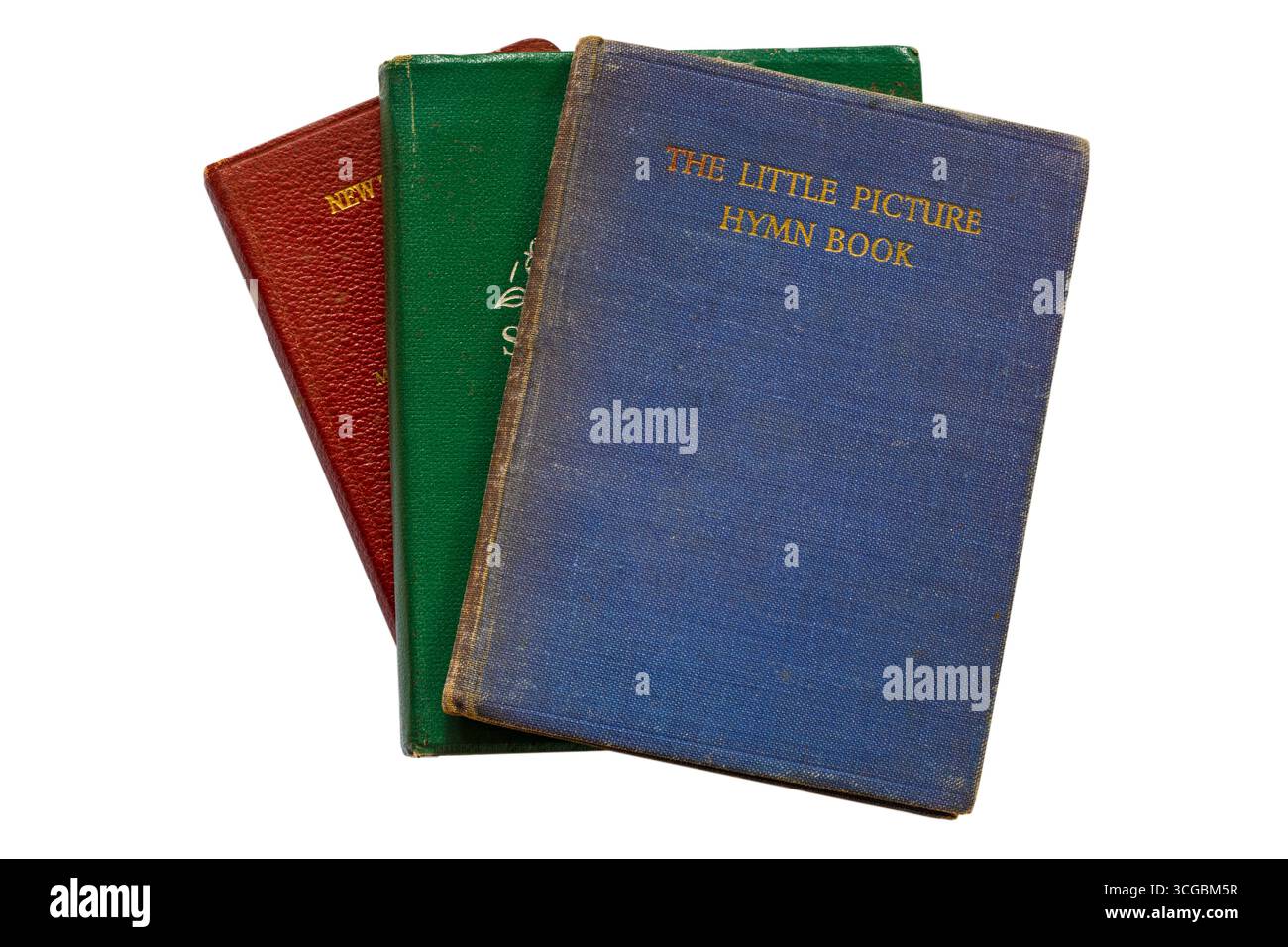 Selection of old vintage hardback books with The Little Picture Hymn Book on top isolated on white background - illustrated by Cicely Mary Barker Stock Photo