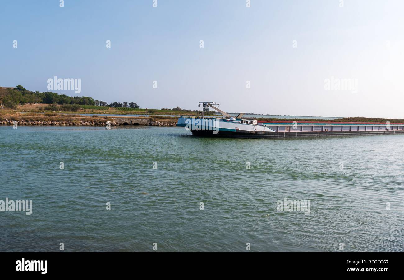 Barge on the Rhône to Sète canal, Hérault, France Stock Photo