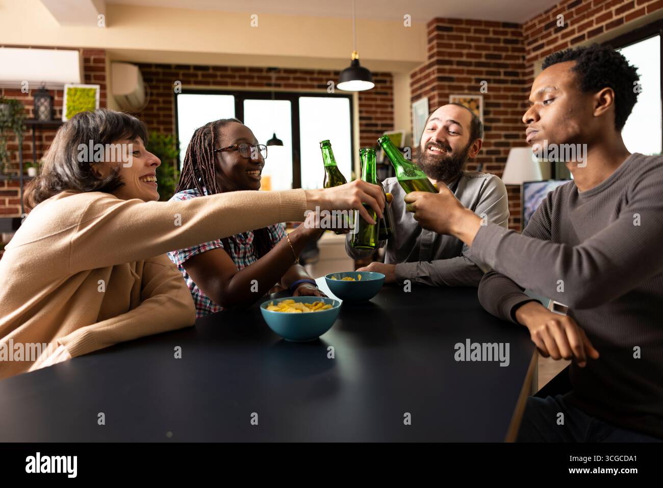 Multicultural group around table hi-res stock photography and images ...