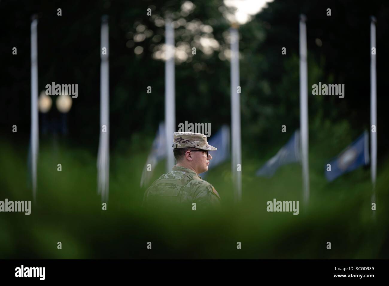 A member of the US National Guard stands by at Columbus Plaza near ...