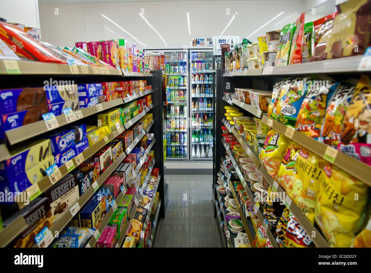A Bright Convenience Store Aisle Lines Up Boxed Cookies And Salty A Bright Convenience Store Aisle Lines Up Boxed Cookies And Salty