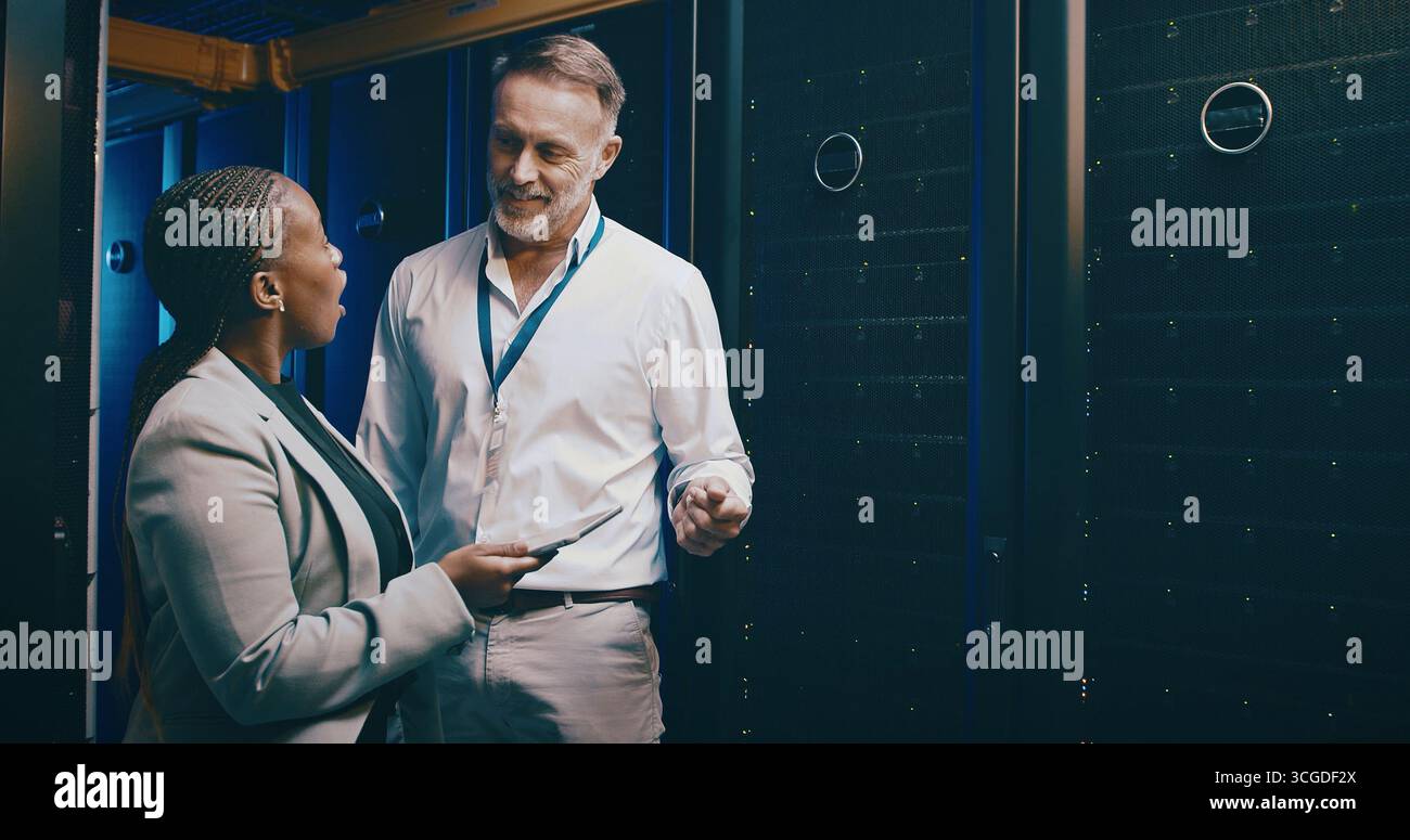 Tablet, team and people in data center for talking, cloud computing or shock for IT solution. Collaboration, tech and engineer in server room for Stock Photo
