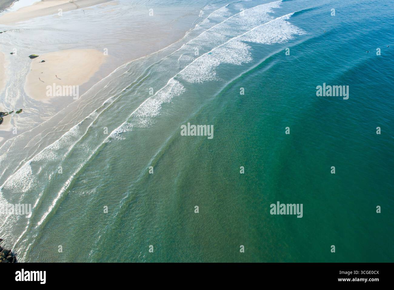 Serene empty beach gentle waves hi-res stock photography and images - Alamy