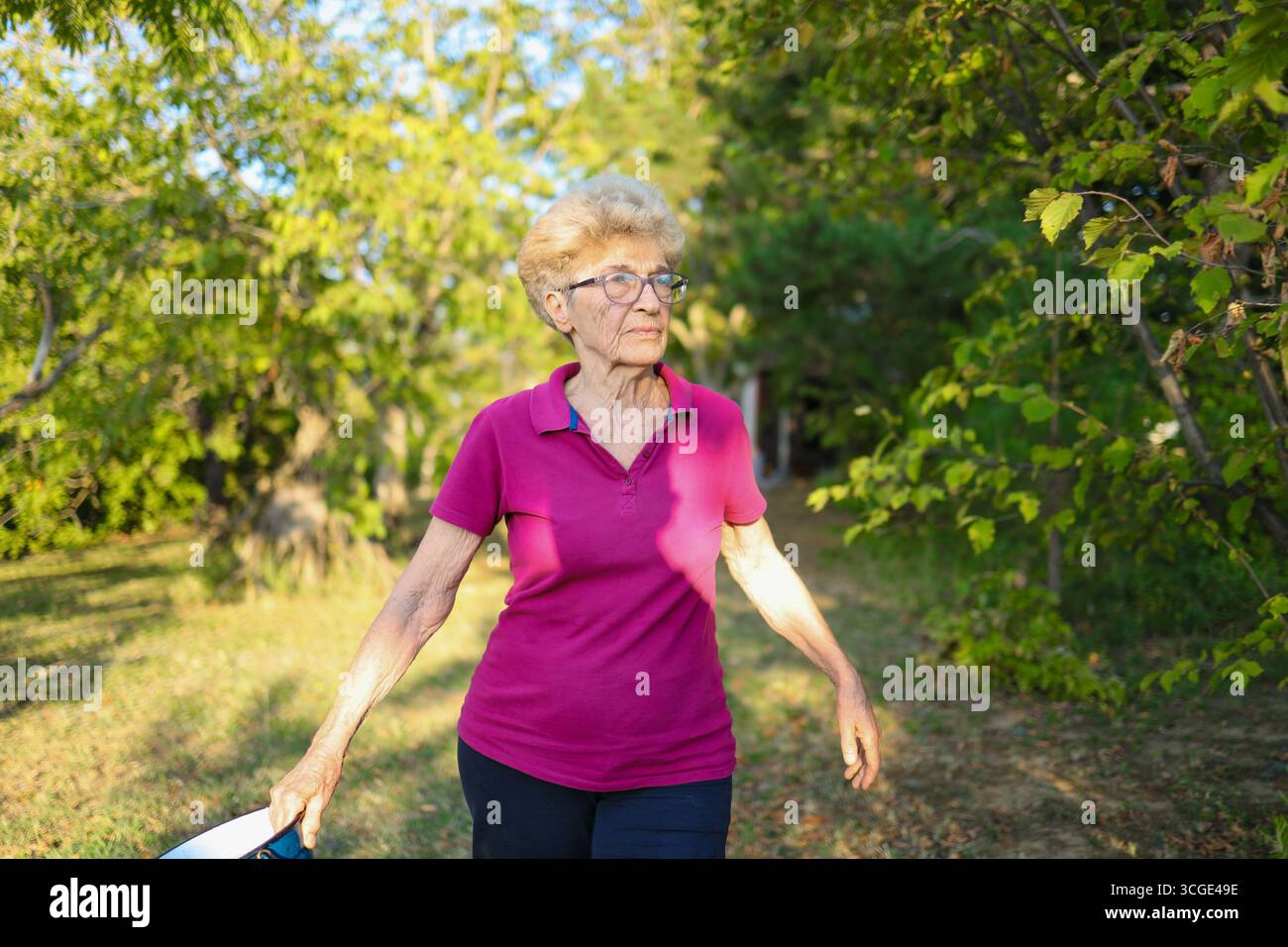 Woman in her 80s hi-res stock photography and images - Alamy