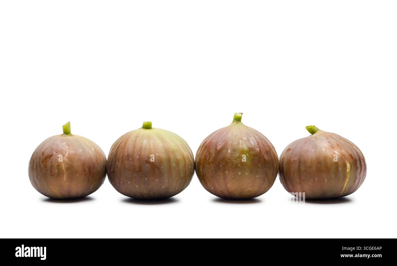 Fresh ripe figs displayed on white background. Stock Photo
