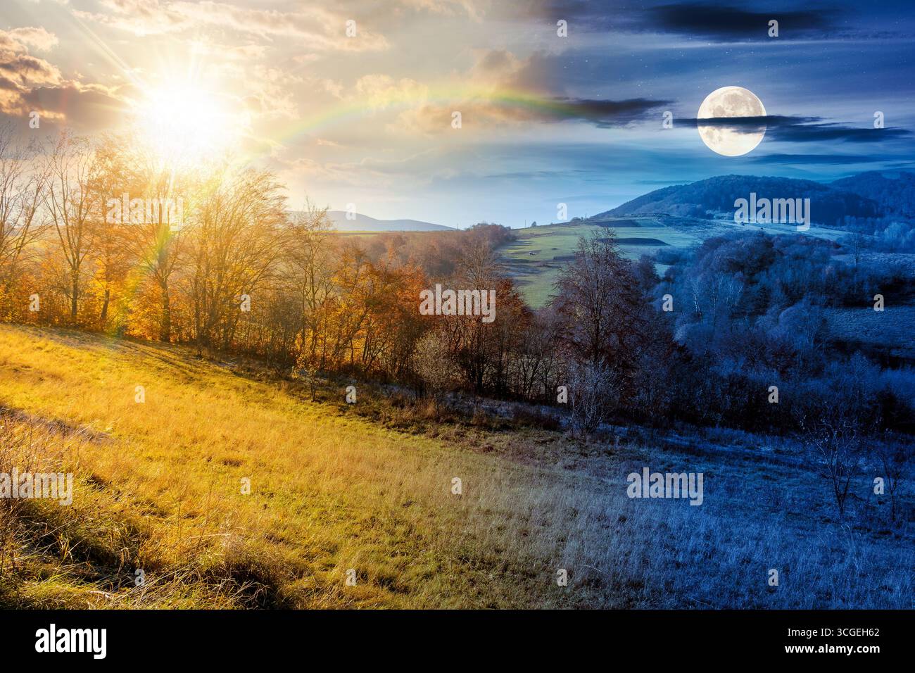 rural landscape on autumn equinox. day and night time change concept. trees on rolling hills. scenic view of mountainous countryside in fall season wi Stock Photo