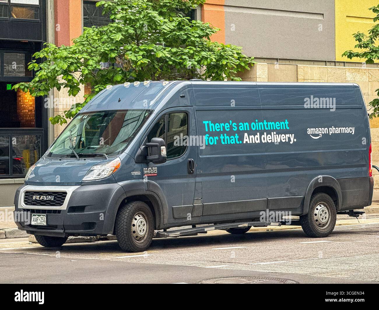 Denver, Colorado, USA - 2 June 2025: Delivery van used by the Amazon Pharmacy stopped in the city centre. - Smartphone Captured Stock Image Denver, Colorado, USA - 2 June 2025: Delivery van used by the Amazon Pharmacy stopped in the city centre. - Smartphone Captured Stock Image