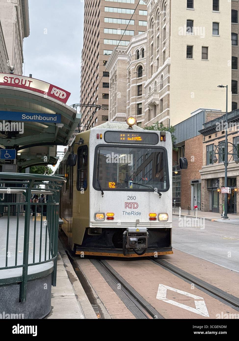 Denver, Colorado, USA - 4 June 2025: Electric tram at a station in downtown Denver. - Smartphone Captured Stock Image