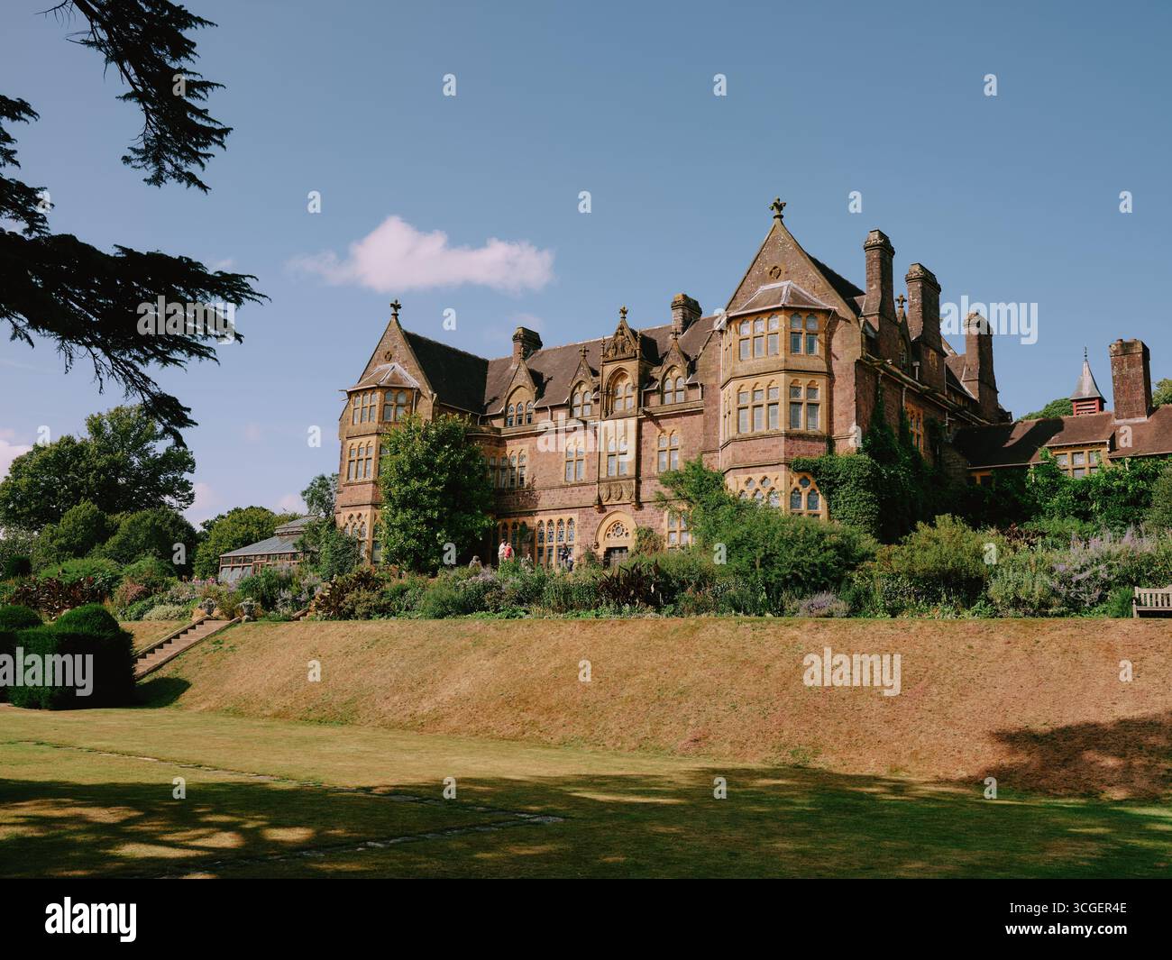 Knightshayes Court is a Victorian country house near Tiverton, Devon, England, designed by William Burges for the Heathcoat-Amory family. Stock Photo