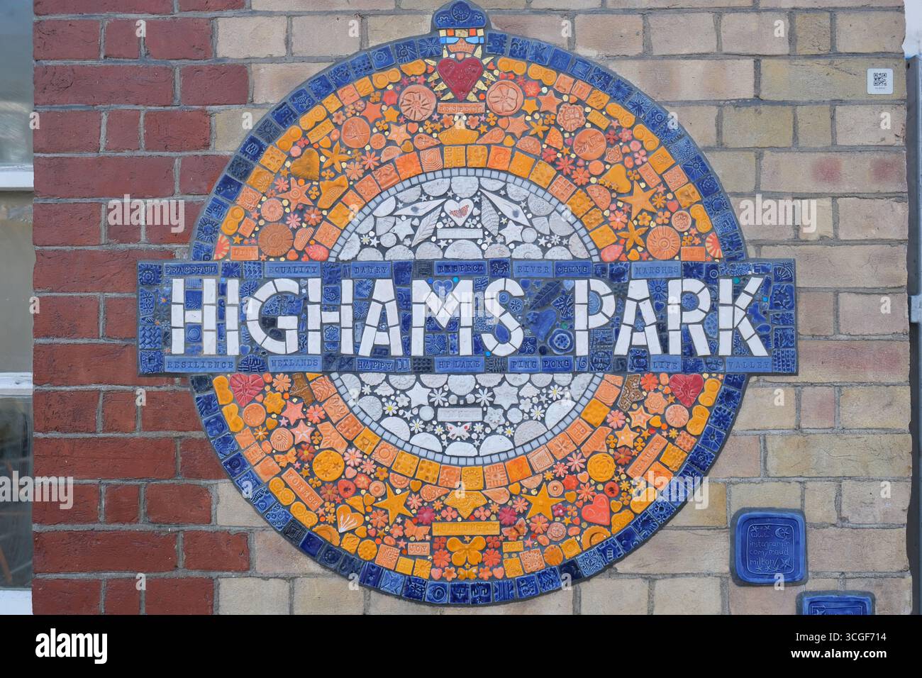 A mosaic sign at Higham Park Overground station by artist Maud Milton ...