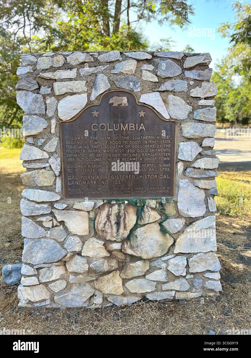 A historic plaque marking Columbia, a California State Historic Landmark and former Gold Rush town, displayed in Columbia State Historic Park - Smartphone Captured Stock Image