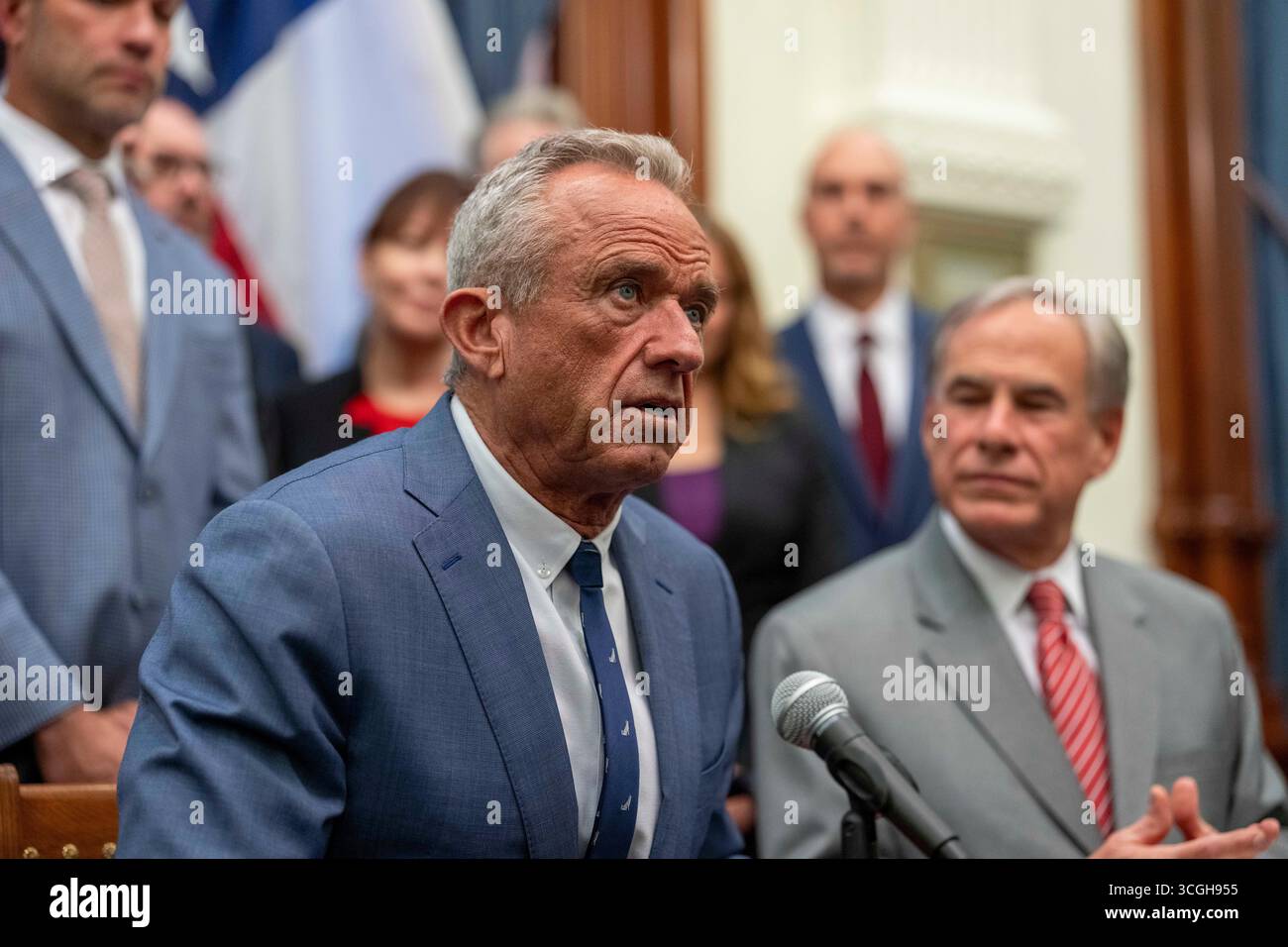 Austin, United States. 28th Aug, 2025. U.S. Secretary of Heath and Human Services (HHS) ROBERT F. KENNEDY, JR. speaks to the press about Texas' health care initiatives in a press conference with Texas Governor GREG ABBOTT (r) at the Texas Capitol on August 28, 2025. Kennedy is facing questions about his role in recent Centers for Disease Control (CDC) shakeups. Credit: Bob Daemmrich/Alamy Live News Stock Photo