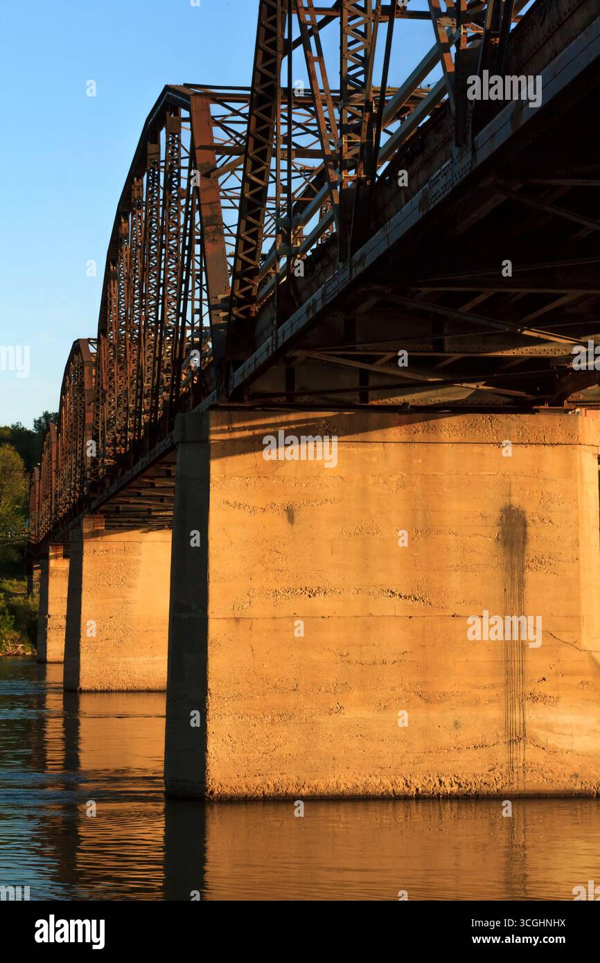 A modern steel structure, the rebuilt Traffic Bridge spans the South Saskatchewan River, reconnecting downtown Saskatoon with the east side. Stock Photo