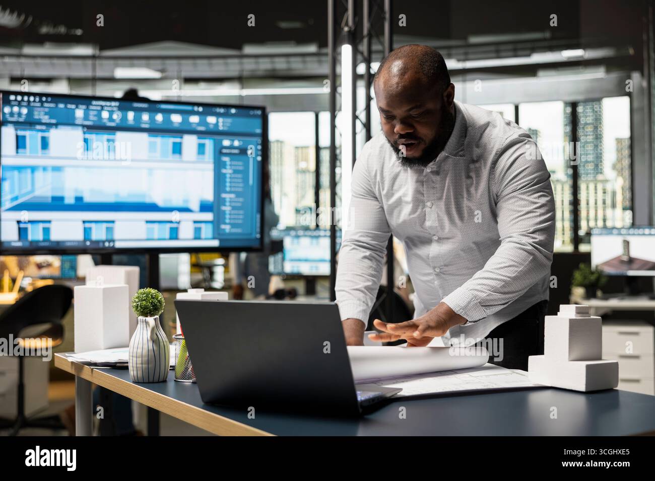 African american male developer studies zoning regulations for site ...