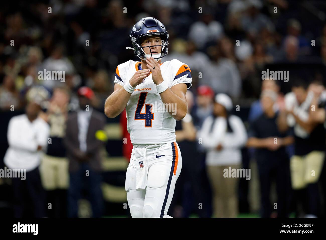 Tyler Ehlinger Denver Broncos quarterback Sam Ehlinger (4) calls a play during an NFL ...