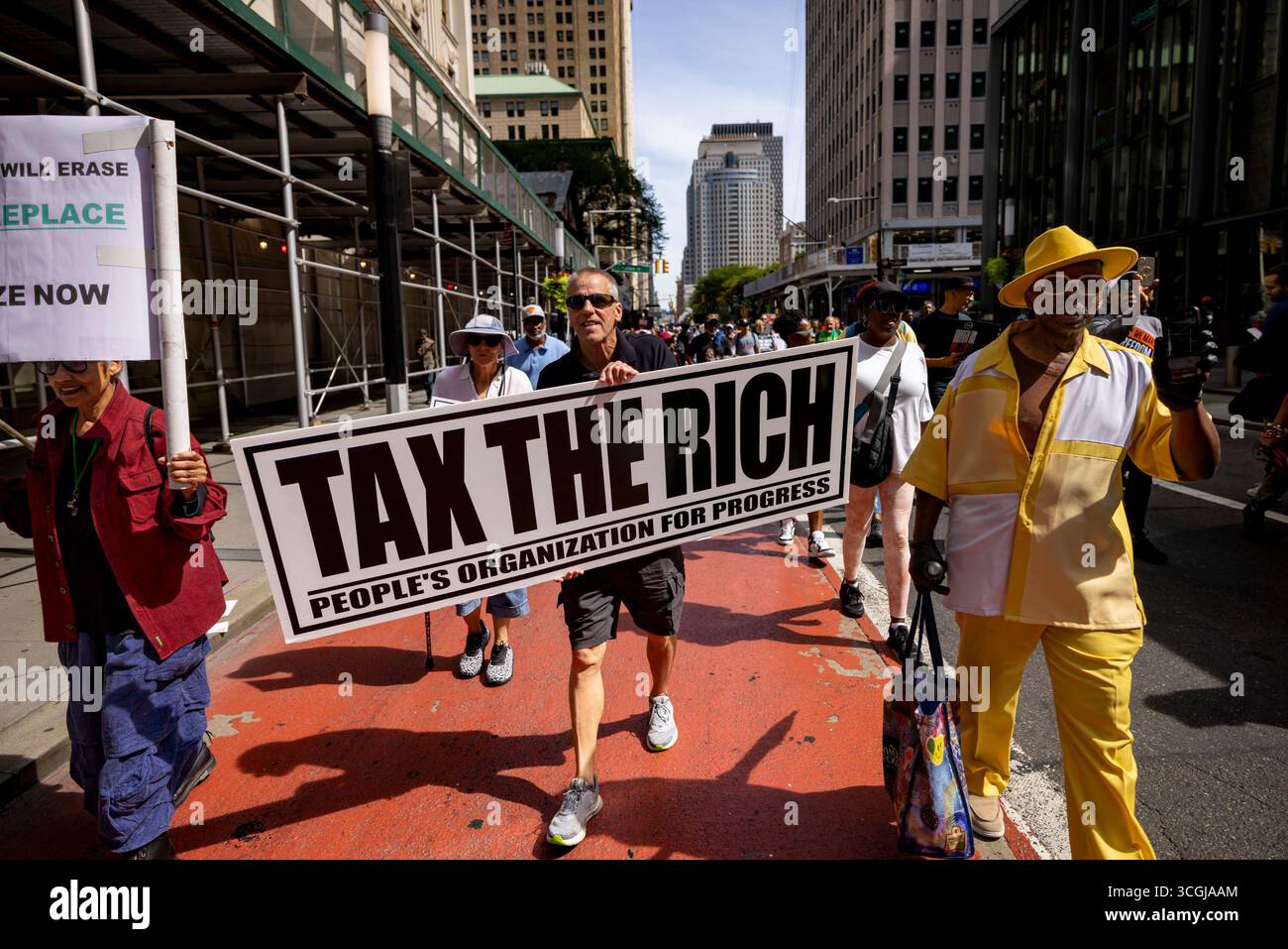 NEW YORK, NEW YORK - AUGUST 28: People participate in the March on Wall ...