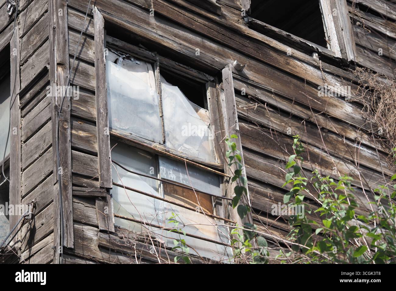 Abandoned wooden building window with broken glass Stock Photo - Alamy