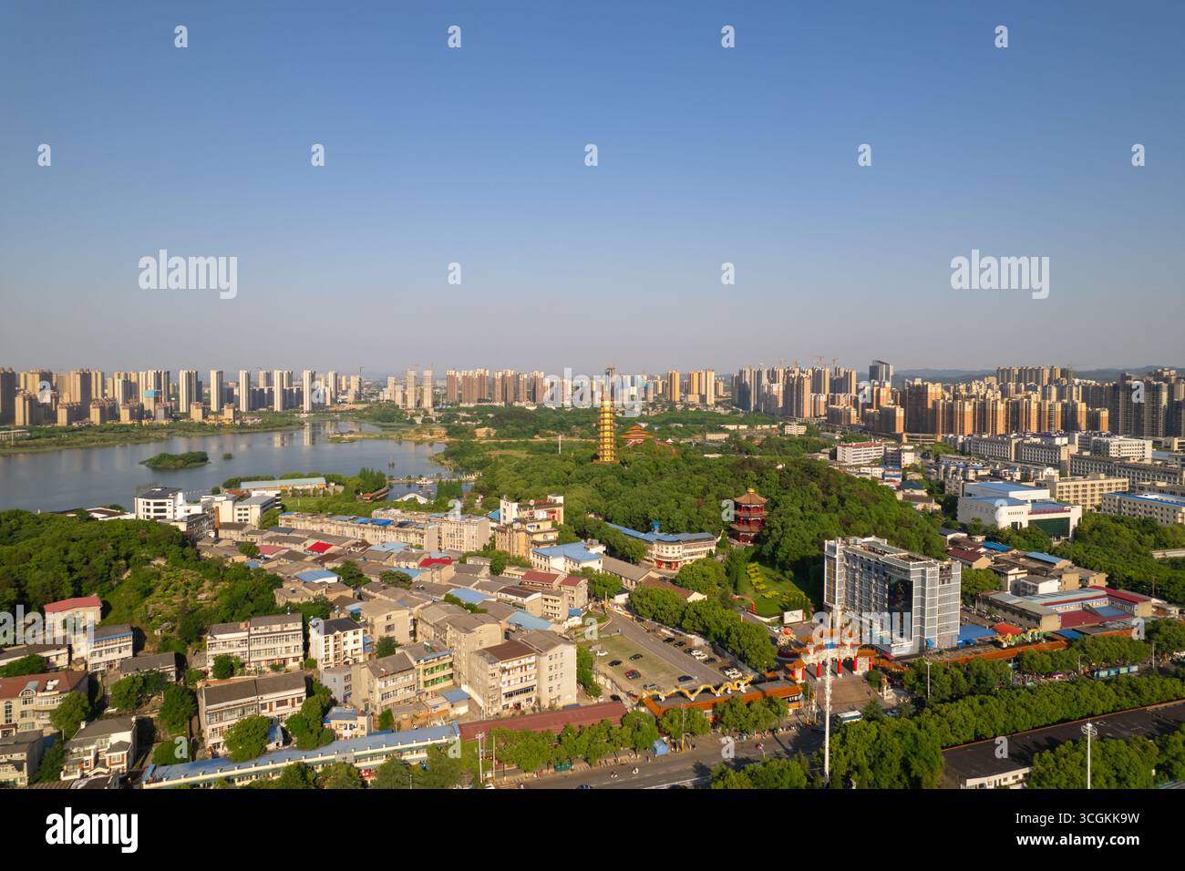 City spreads across landscape next hi-res stock photography and images ...