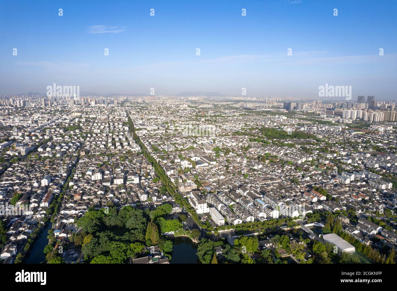 Image showcasing Aerial view of a sprawling city with traditional architecture ...