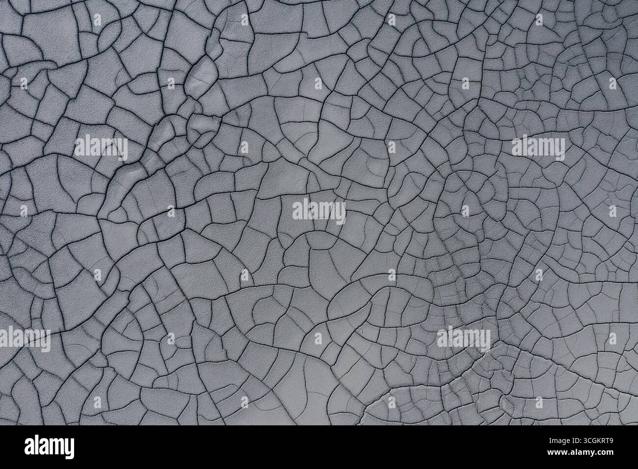 Abstract Mud Pattern Aerial view of gray abstract mud patterns and cracks on acid mine ...