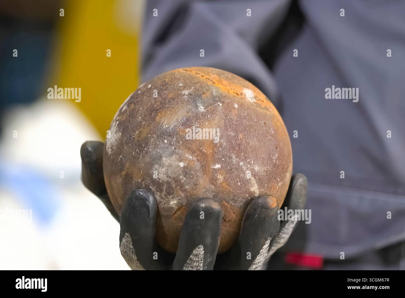 steel ball from a mill for grinding gold ore. Stock Photo