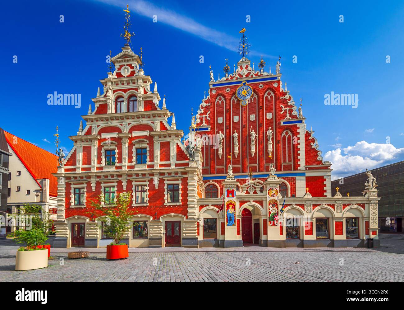 Riga, Latvia. City Hall Square with House of the Blackheads, sunset summer hours. Stock Photo