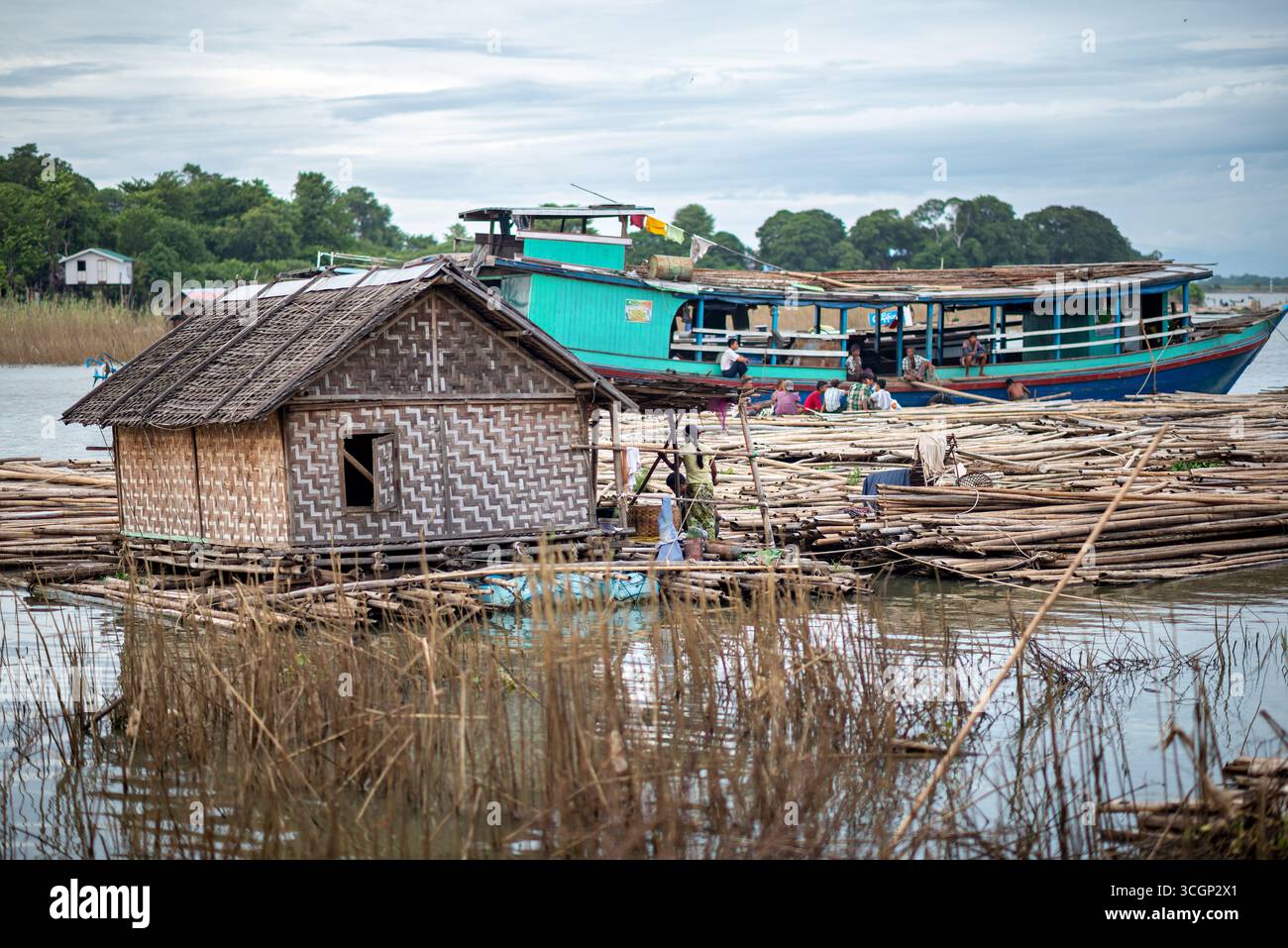 Ayeyarwaddy River Floating House Bamboo Rafts Boat Mandalay Myanmar // waterfront Stock Photo