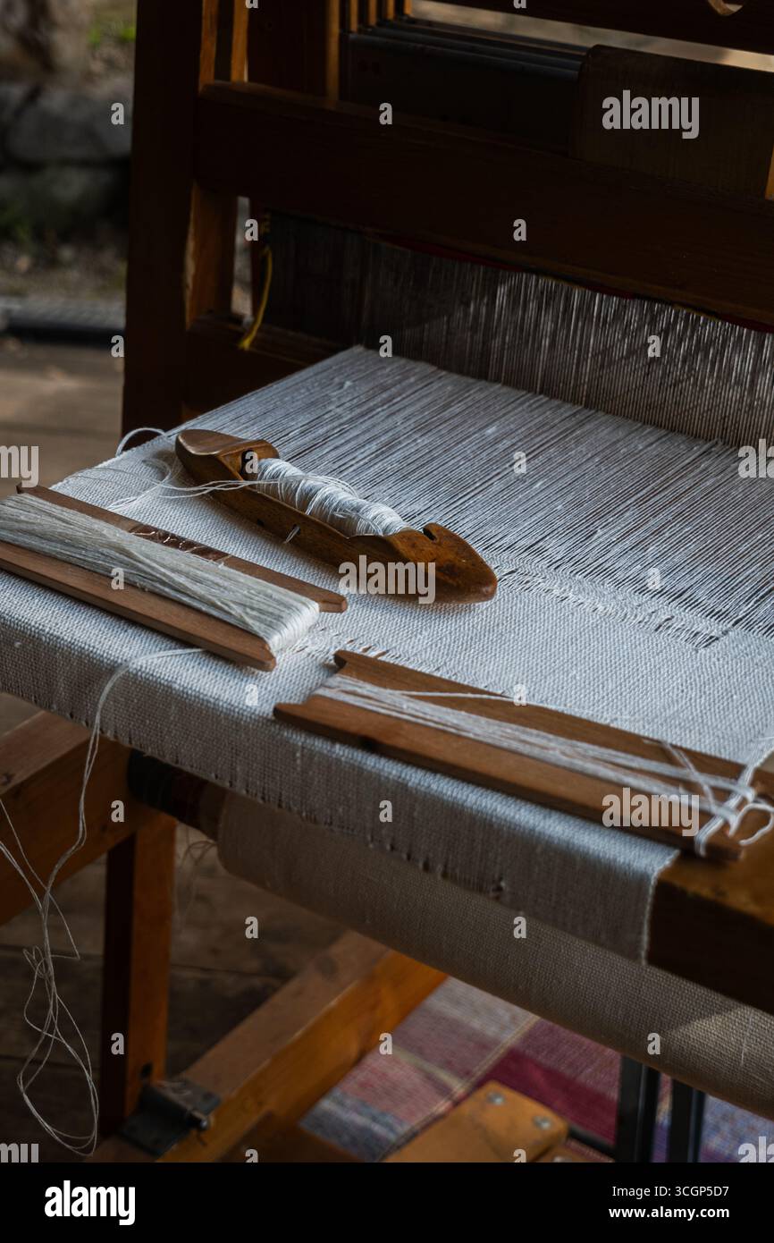 Traditional wooden weaving loom with shuttle and threads – textile ...