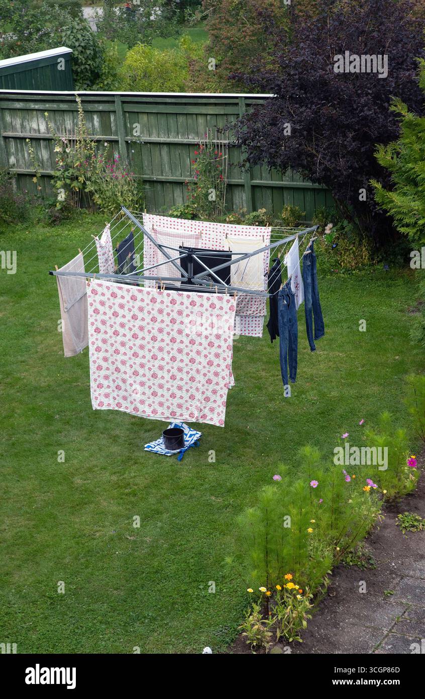 clothes drying rack with laundry in the garden Stock Photo