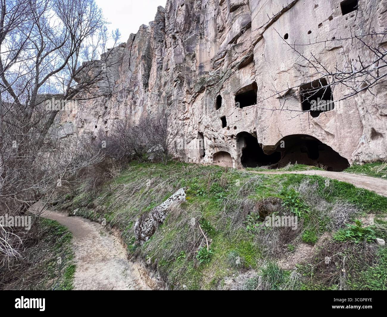 a soil path near and old cave in the valley Stock Photo