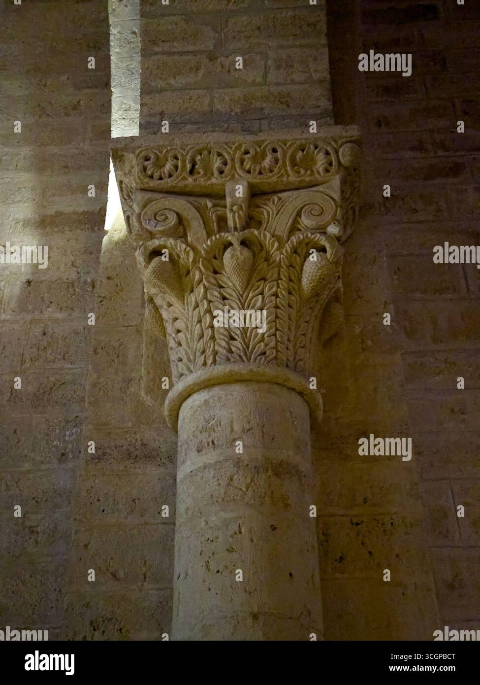 Medieval Coloumn Detailed stone carvings on medieval columns inside Romanesque church ...