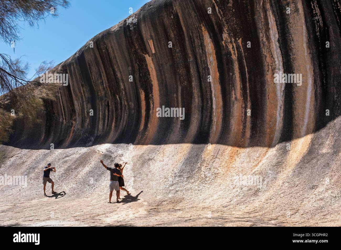 Tourists at Wave Rock, Hyden, Western Australia Stock Photo