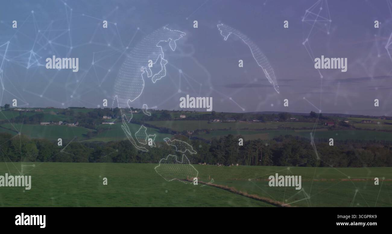 Hovering semi-transparent globe floating above pasture with narrow path, displaying network lines Stock Photo