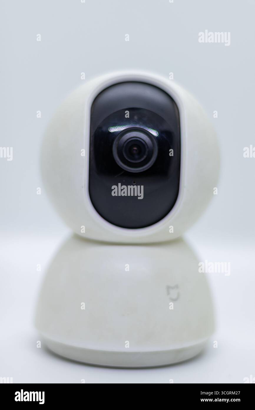 Modern CCTV security camera closeup on white background Stock Photo