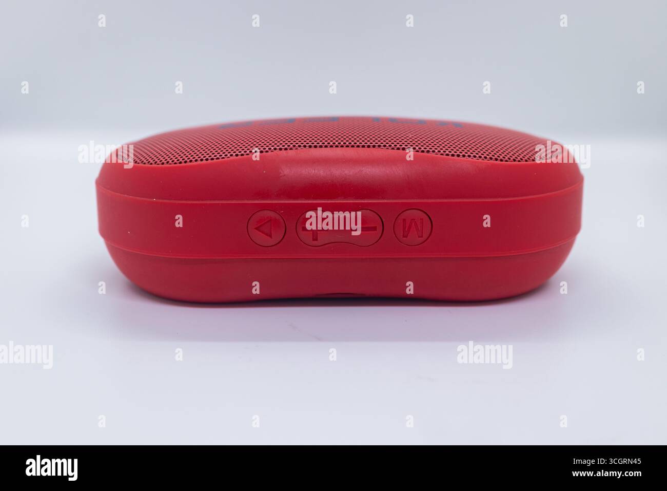 Red Bluetooth Speaker with Control Buttons Stock Photo