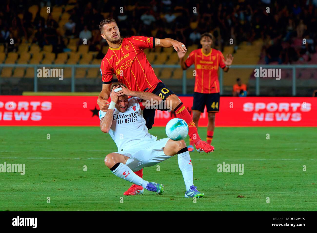 Ylber Ramadani of US Lecce in action against Santiago Gimenez of AC ...