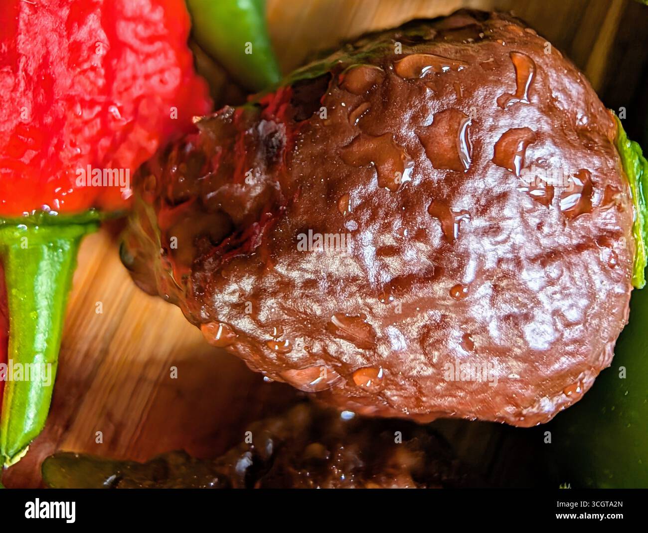 super hot peppers including the carolina reaper mexican themed cooking photo - Smartphone Captured Stock Image