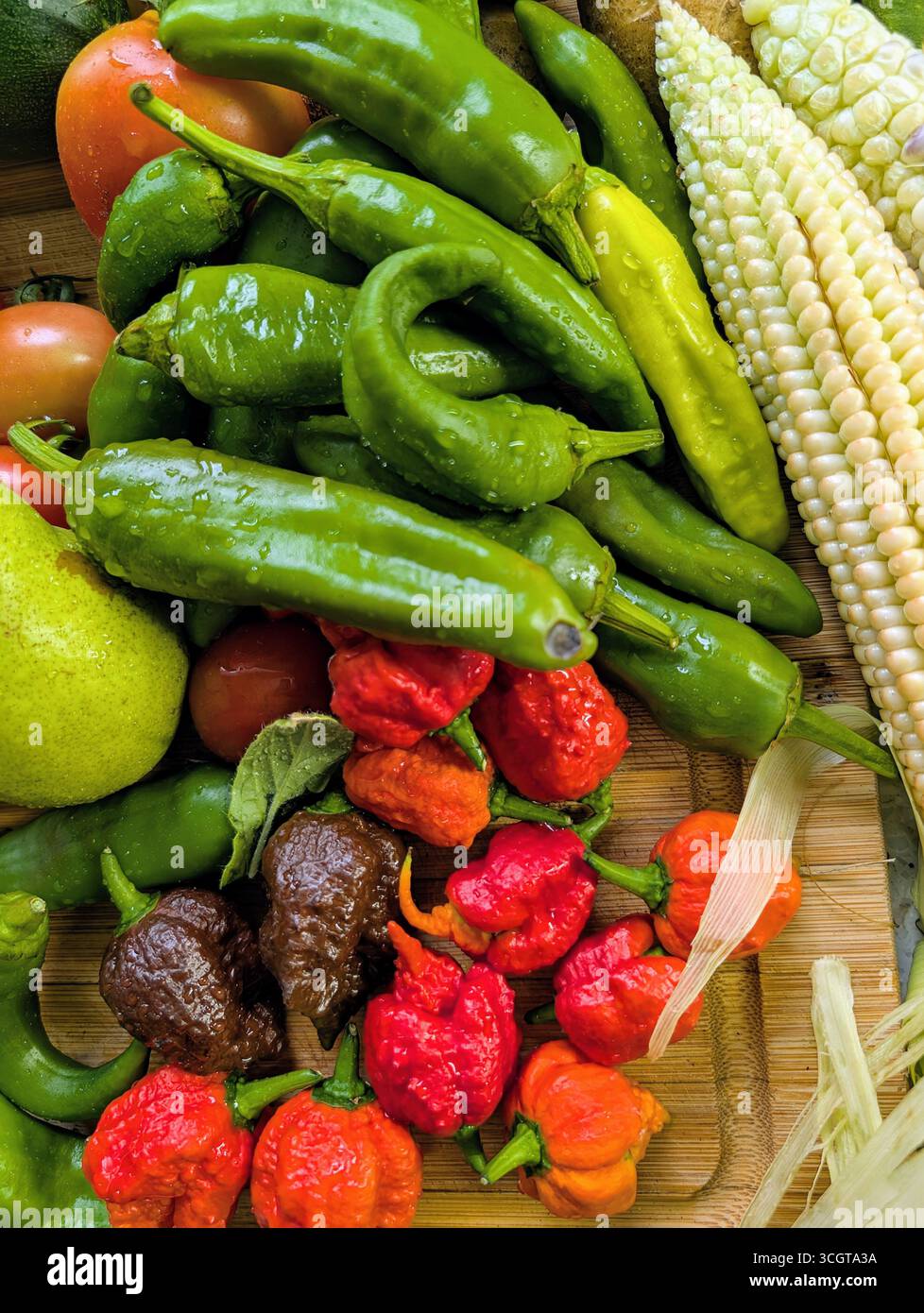 super hot peppers including the carolina reaper mexican themed cooking photo - Smartphone Captured Stock Image