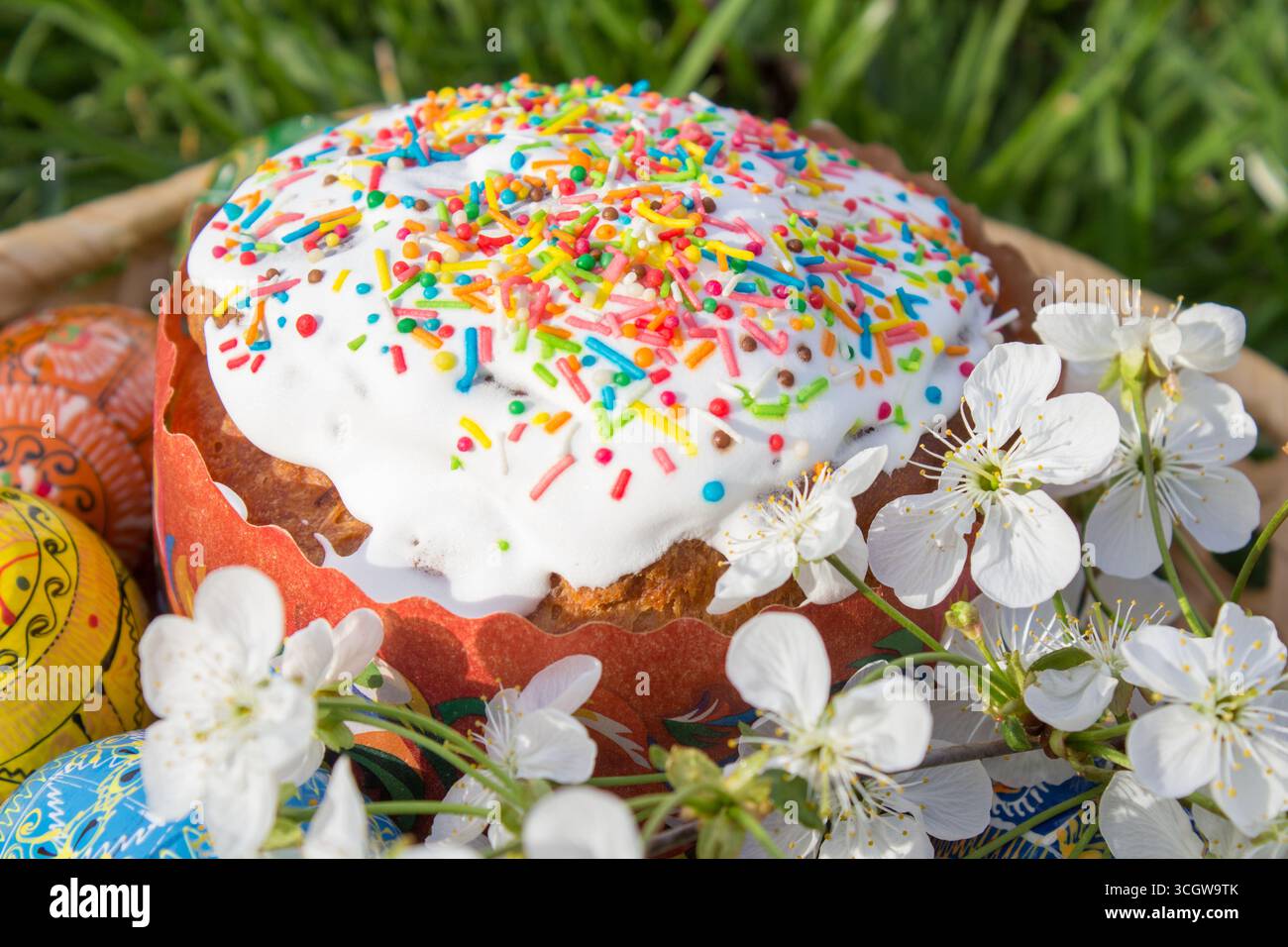 Easter holiday, closeup on the grass Easter cake with Easter eggs Stock Photo