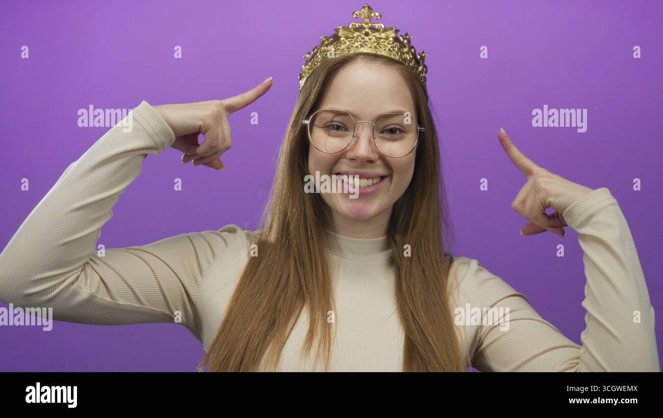 Woman wearing gold crown smiles hi-res stock photography and images - Alamy