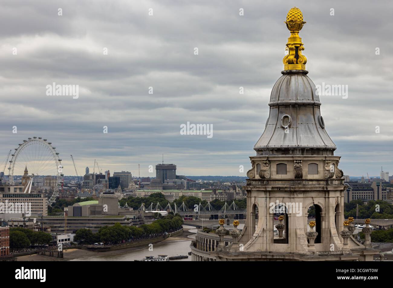 Panoramic view of central London with the River Thames, the London Eye on the skyline, and the dome of St Paul’s Cathedral. Stock Photo