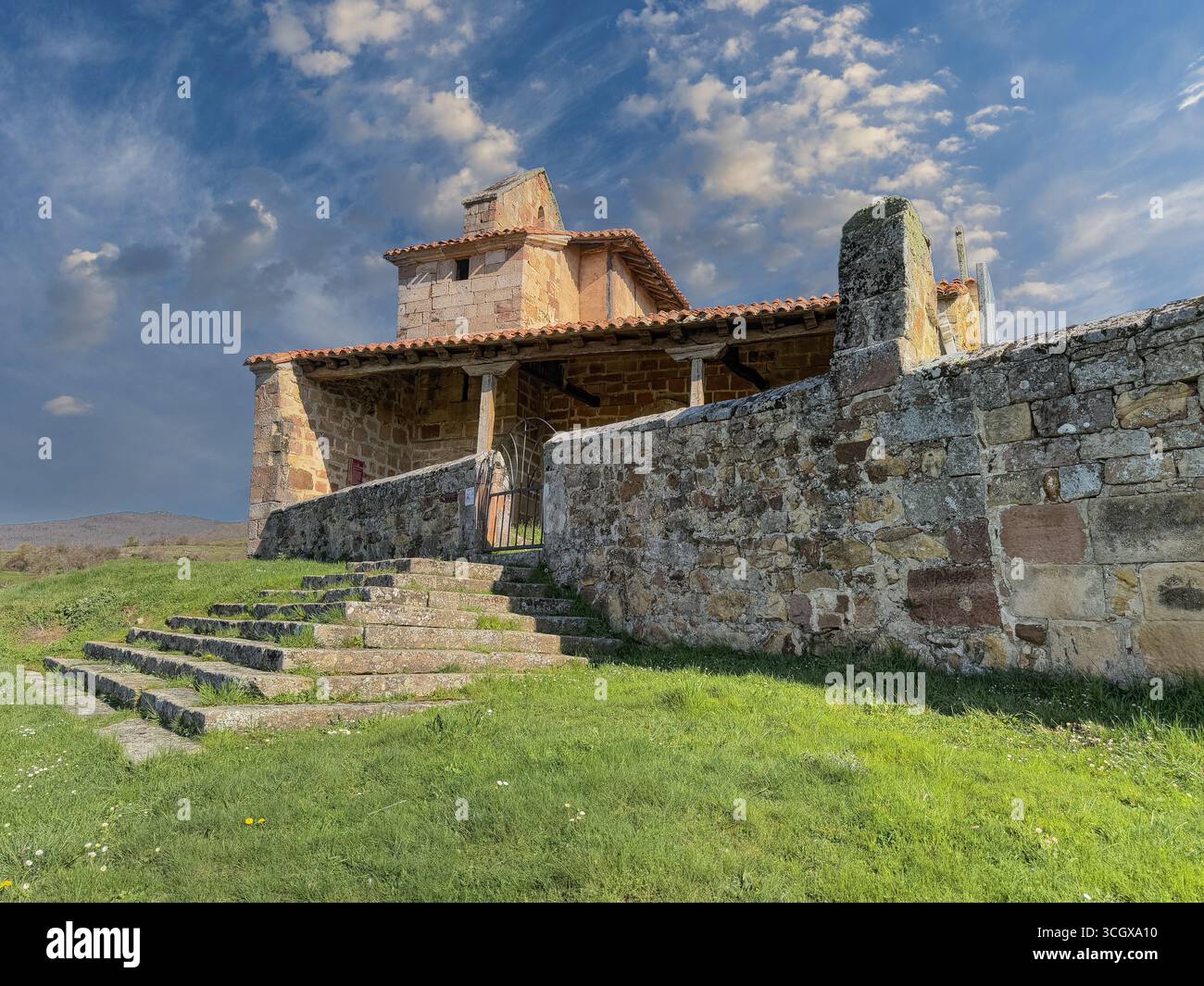 Charming stone church in Villabellaco with arched porch and bell gable ...