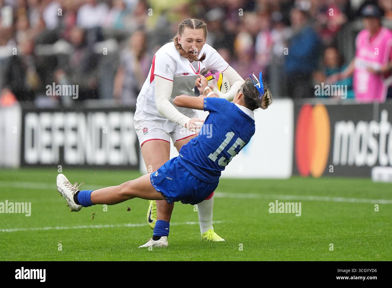 Emma Rugby England's Emma Sing (left) is tackled by Samoa's Karla Wright-Akeli ...