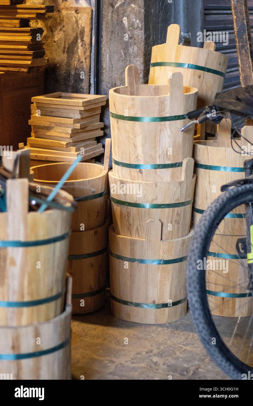 Traditional Bucket pile of new traditional buckets in a shop front Stock Photo - Alamy