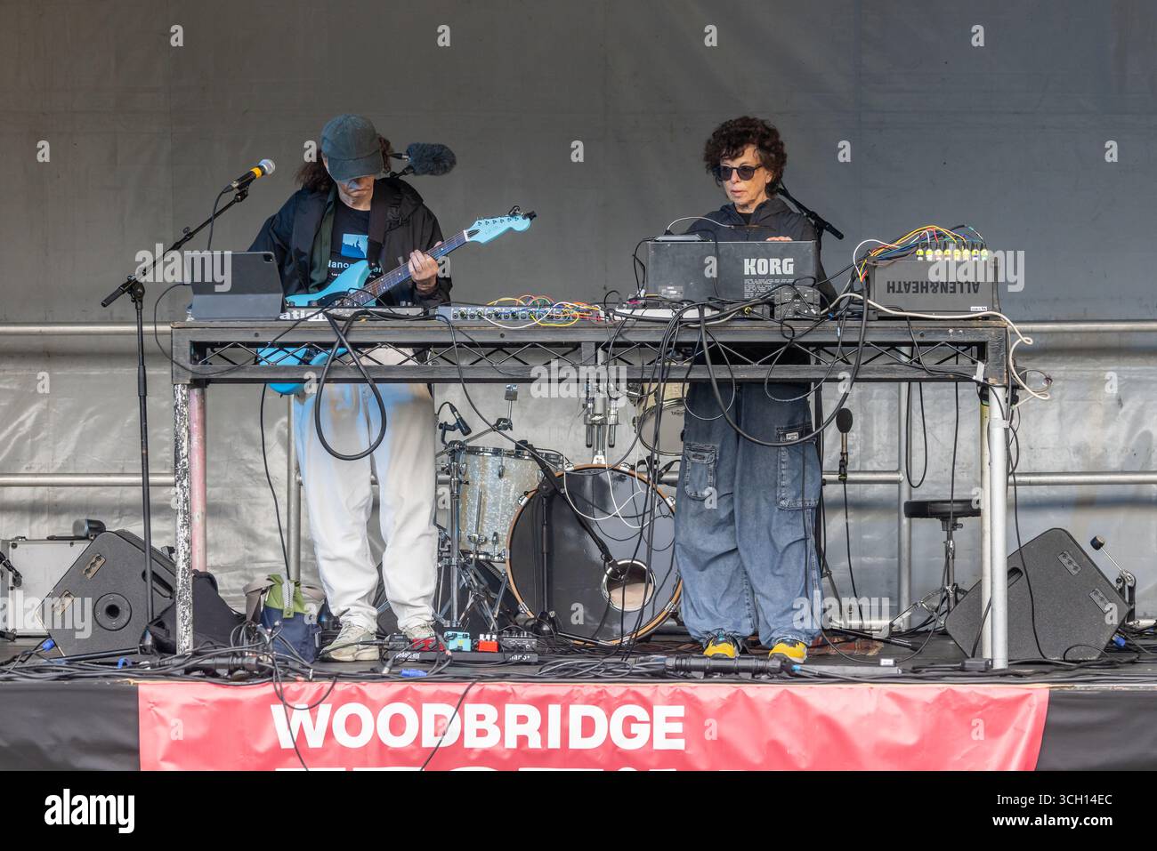 Immersion - Colin Newman (Wire) & Malka Spigel (Minimal Compact) - performing at Woodbridge Festival of Art & Music in Elmhurst Park on 30 August 2025 Stock Photo